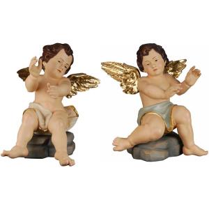 Putto seduto sx/dx
