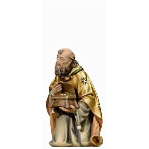 Re magio inginocchiato