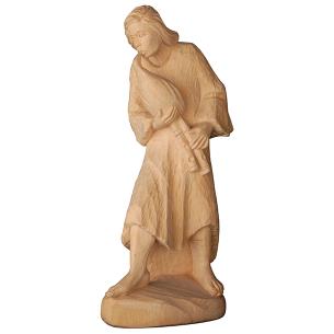 Heardsman with bagpipe in Swiss pine