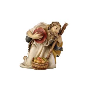 RA Shepherd kneeling with stick