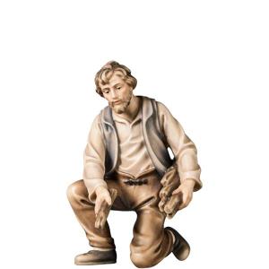 H-Kneeling farmer with firewood