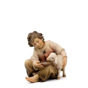 Child with sheep