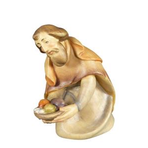 Pastore con doni in ginocchio