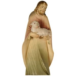 Shepherd standing with sheep