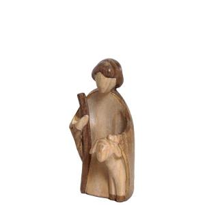 Pastore inginocchiato con pecora