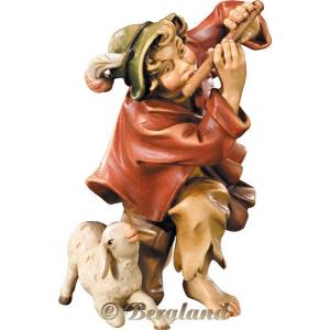Herdsman knelling with flute and lamb